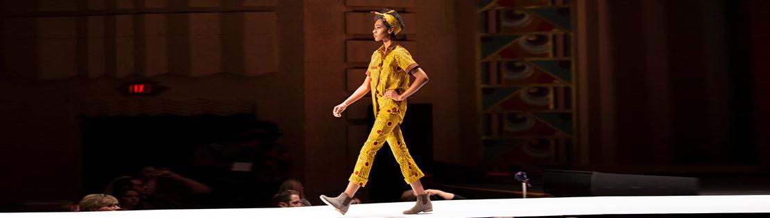 A Pima student walks the runway in a fashion show